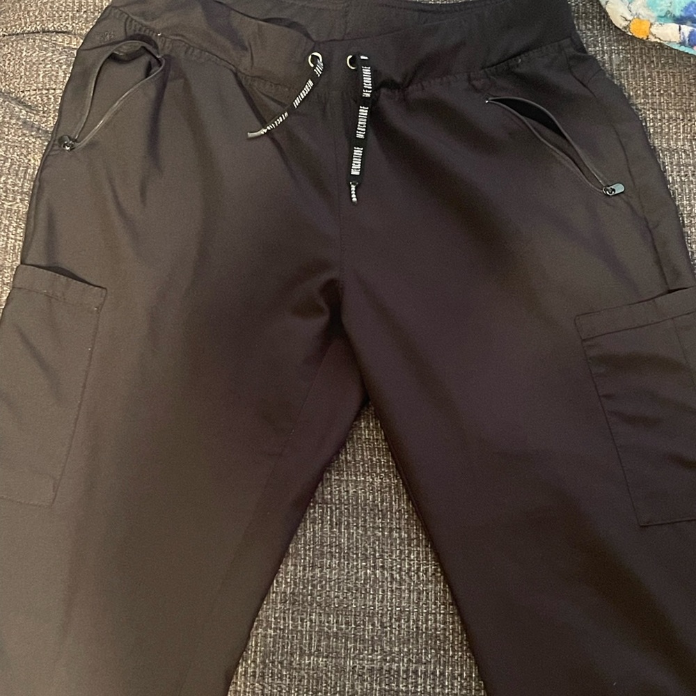 Black size large top and size large bottoms, med couture scrubs.
